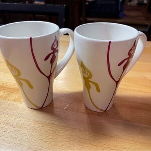 Starbucks White Mugs with Red and Yellow Floral Design